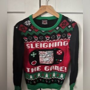 Sleighing the game Christmas sweater boys